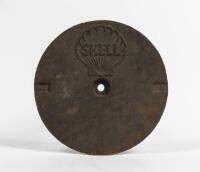 SHELL: A cast iron SHELL tank filler cover plate with small filigree style clam shell.