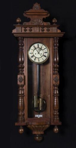 CLOCK : A circa 1890's German 'Vienna' 8-day two weight regulator wall clock attributed to Gustav Becker, with enamel dial, in later walnut case, hour and half hourly strikes, 132cm high, 47cm wide, 16cm deep (working)