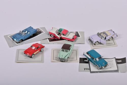 FRANKLIN MINT: A group of six 1:43 scale Franklin Mint - 'The Classic Cars of the Fifties'. Includes 1953 STUDEBAKER COMMANDER STARLINER & 1955 FORD FAIRLANE CROWN VICTORIA