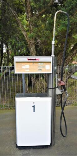 PETROL PUMP: A circa 1980s double sided petrol pump, 234cm high x 100cm wide