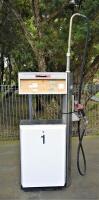 PETROL PUMP: A circa 1980s double sided petrol pump, 234cm high x 100cm wide
