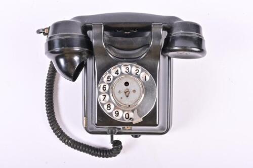 TELEPHONE: A 1940/50s ATE Bakelite wall telephone, 20cm high, 16cm wide