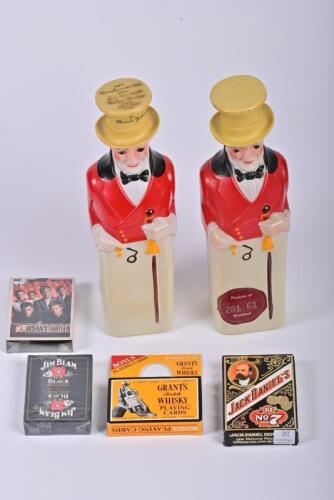 JOHNNY WALKER: A 1960s Johnny Walker decanter, inscribed to lid 'Compliments from JJ Roberts Motor Traders', 28cm high, together with four packs of whisky related playing cards