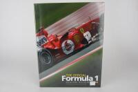 WEBBER: A Mark Webber signed copy of 'The Official Formula 1 Season Review 2004'.