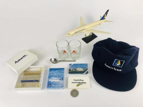 ANSETT: A 1990's 1:200 Ansett Boeing 747 plastic model on stand, 30cm x 24cm, good condition, A 1:200 Ansett Boeing 777 plastic model on stand, 28cm x 25cm in good condition, one Ansett Australia wool, viscose large sized cap, as new condition, one Ansett