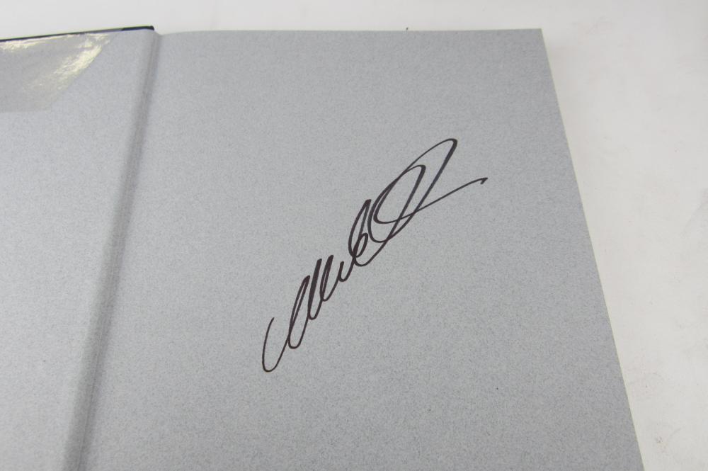 WEBBER: A Mark Webber signed copy of 'The Official Formula 1 Season ...