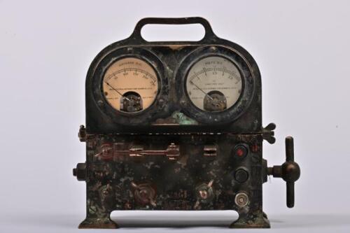 BATTERY TESTER: A vintage battery tester with volts and amps gauges by Weston Electrical Instruments Corp, U.S.A. Circa 1920's