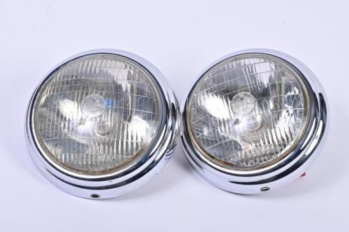 HEADLAMPS: A set of genuine LUCAS headlamp reducing rims. Suits MG TC and Jaguar, etc