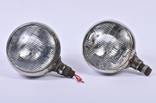 HEAD LAMPS: A pair of 7 inch free standing head lights