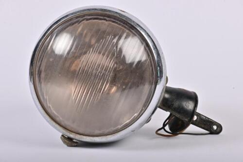 LUCAS: A large Lucas King of the Road headlamp with glass and mounting arm