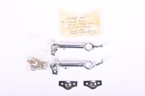 BONNET CATCHES: A set of chrome bonnet catches