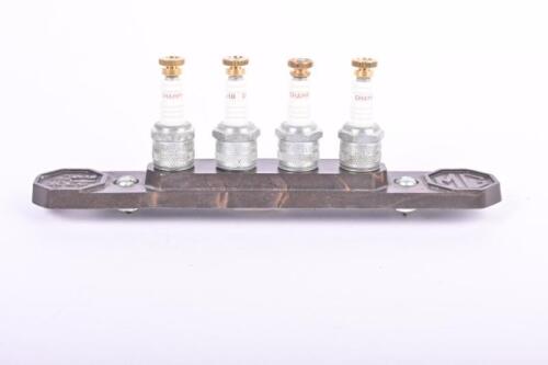 SPARK PLUG HOLDER: A pre-war and T-Type MG spark plug holder, with new Champion L-10 spark plugs