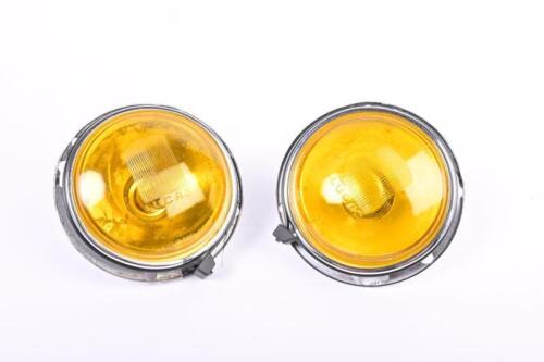 LUCAS: A pair of Lucas amber glass (4LR) fog lamps and mountings