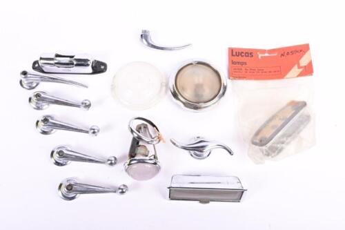 INTERIOR CAR FITTINGS: A box with interior fittings including ashtray, roof light, window winders. New old stock LUCAS number plate lamp