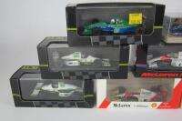 F1 MODELS: A group of boxed F1 1:43 scale models. - 2