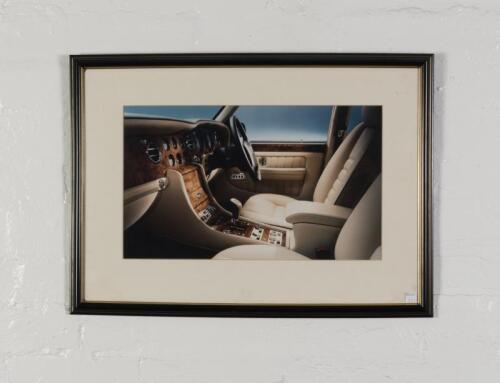 SHOWROOM: A RR showroom display print featuring a Silver Spur in blue and an interior photo, both framed, largest image 46.5cm high x 82cm wide.