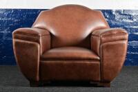 LOUNGE CHAIR: An Art Deco style club leather lounge chair