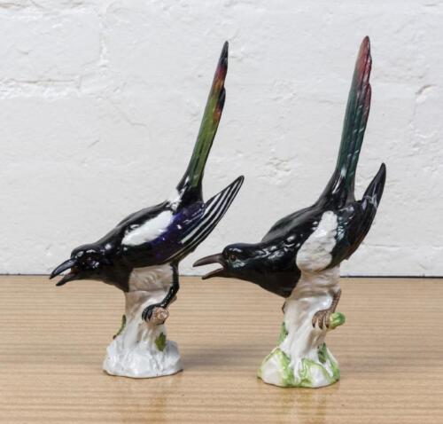 DRESDEN: A pair of Dresden porcelain magpies (AF), each 25cm high