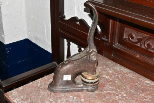 EMBOSSING STAMP: A vintage cast iron embossing stamp, 25cm high of the Australian Stock Exchange