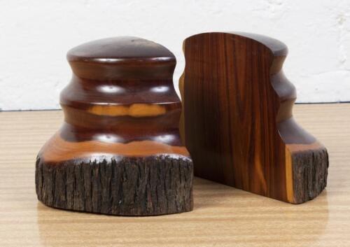 BOOKENDS: Two bookends formed from two halves of a turned log, each 12.5cm high