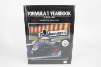 FORMULA 1: 'Formula One Yearbook 1997-98' hardcover book with multiple F1 driver signatures. Includes Alesi, Irvine, Schumacher signatures.