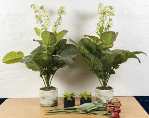 PEDESTAL: Four potted faux flowers, two with ceramic marbled effect pots, 90cm high