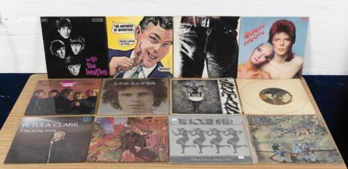 VINYL RECORDS: A collection of vintage vinyl records including 'With the Beatles' by the Beatles, 'Sticky Fingers' by the Rolling Stones, 'Pinups' by David Bowie, Santana, Frank Zappa and others