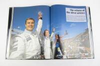 FORMULA 1: 'Formula One Yearbook 1997-98' hardcover book with multiple F1 driver signatures. Includes Alesi, Irvine, Schumacher signatures. - 4