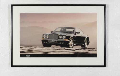 BENTLEY: A showroom photographic print of a Bentley Continental T, image 47cm high x 83cm wide.