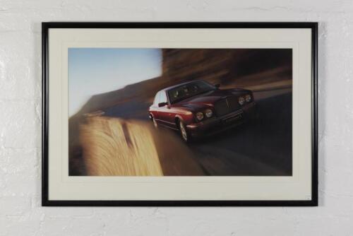 BENTLEY: A showroom photographic prints of the Bentley R Continental, mounted framed and glazed, 68cm high x 102cm wide overall