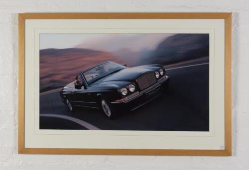 BENTLEY: A showroom photographic print depicting the Bentley Azure, mounted, framed and glazed, 69cm high x 104cm wide overall