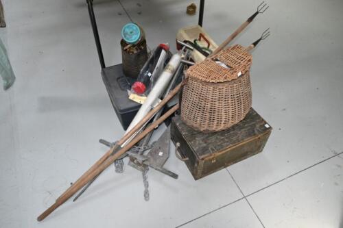 FISHING TACKLE: A collection of vintage tackle boxes and fishing related items, including tackle boxes with various hooks, line, reels and weights, two tridents and an anchor