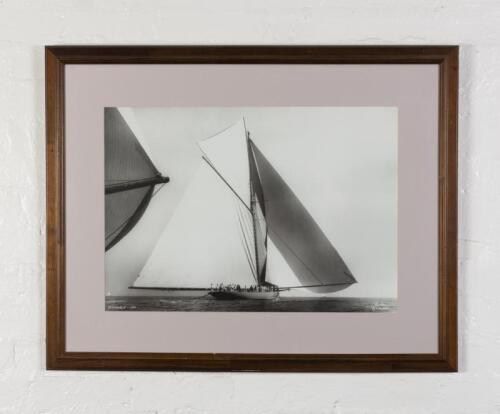 FRANK BEKEN: A print of Frank Beken photograph of Shamrock I 1899 depicting Sir Thomas Lipton's America's Cup challenger going downwind under full sail, mount, framed and glazed, 75cm high x 95cm overall