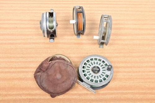 REELS: Four reels by Russons, Oren-O-Matic and Ryobi, with one leather case