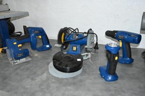 BENCH GRINDER: A Taurus 150W bench grinder, with additional grinding wheel,19cm high, 28cm wide, 17cm deep, together with four battery operated power tools missing the battery