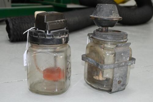 LUCAS: Two glass windscreen washer bottles, circa 1950s, one branded Lucas