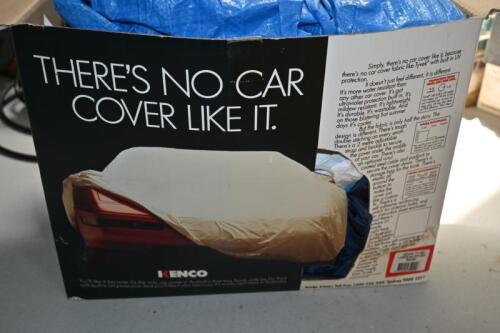 CAR COVER: A car cover and tarp