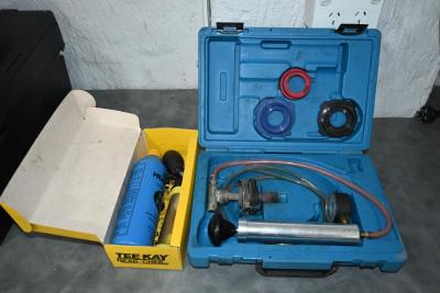 PRESSURE TESTER: An ABV cooling system pressure tester and a Tee-Kay combustion leak detector