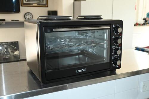 KITCHEN: Three electrical kitchen items including; a Lumina oven/cook top; toaster and sandwich makers plus a hip flask and associated drinking vessels.&nbsp;&nbsp;&nbsp;