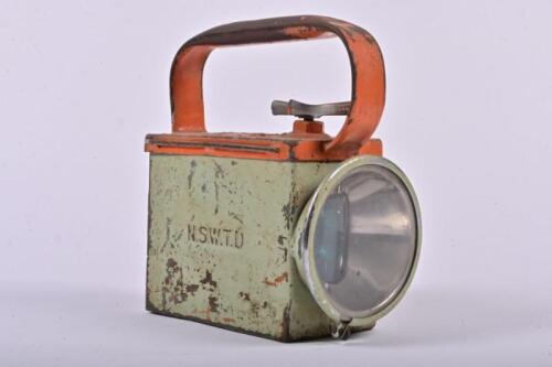 NSW TRANSPORT DEPARTMENT: A N.S.W.T.D. embossed battery operated guards and shunters lamp, 19cm high, 10cm wide, 17cm deep
