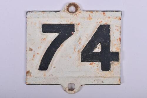 QUEENSLAND RAILWAYS: A cast iron 74 mile track marker, 20 x 20cm