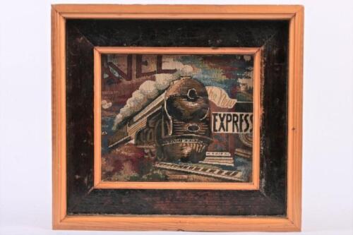 USA: A sample of fabric upholstery featuring an American steam locomotive, framed and glazed, 35.5 x 39cm