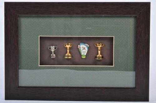 PINS: A collection of Australian sporting related pins, framed and glazed, 21 x 31cm overall