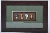 PINS: A collection of Australian sporting related pins, framed and glazed, 21 x 31cm overall