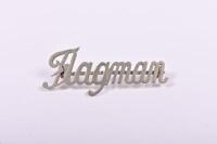 SOUTH AFRICAN RAILWAYS: A metal cap badge 'Flagman'
