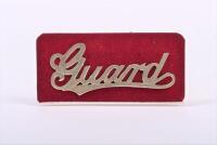 SOUTH AUSTRALIAN RAILWAYS: A brass 'Guard' cap badge, on stand, 8cm long