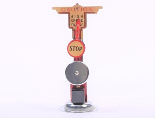 LIONEL: A Lionel electric level crossing tin warning signal, 18.5cm high
