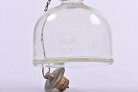 NSW RAILWAYS: A glass train decanter etched N.S.W. G.R., 23cm high - 3