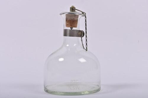 NSW RAILWAYS: A glass train decanter etched P.T.C. N.S.W., 23cm high