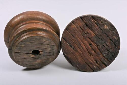 ARCHITECTURAL ELEMENTS: A pair of oak architectural elements, 15cm high, 26cm diameter